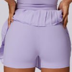 Light purple custom tennis shorts with built-in compression shorts