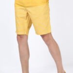 Close-up of fabric on men's yellow striped casual shorts from custom shorts manufacturer