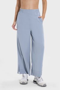 Light blue drape wide-leg pants featuring a side split, shown in a front view.