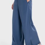 Navy blue drape wide-leg pants with a side split, shown in a front view.