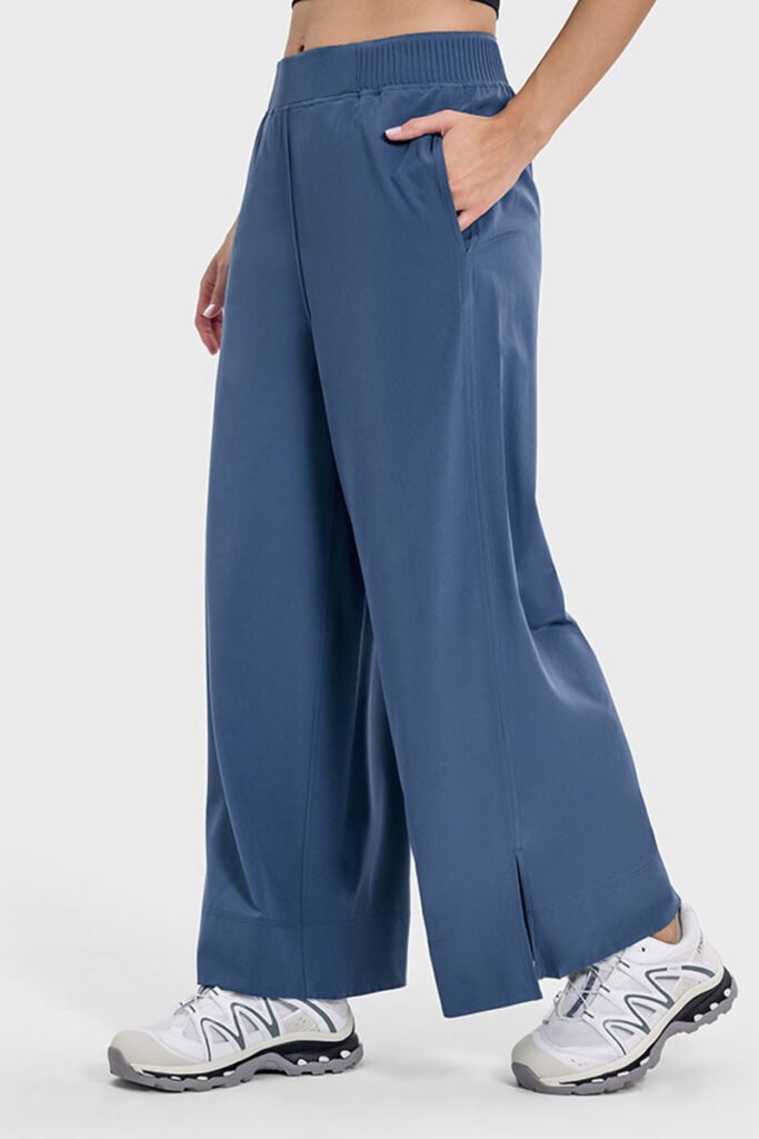 Navy blue drape wide-leg pants with a side split, shown in a front view.